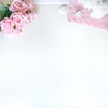 Flat lay with different accessories; flower bouquet, pink roses, open book, Bible Royalty Free Stock Photo