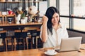 Lifestyle freelance business woman working with laptop computer he has glad on the job Royalty Free Stock Photo