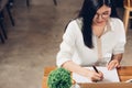 Lifestyle freelance working woman and laptop computer he write b Royalty Free Stock Photo