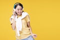 Lifestyle leisure with hobby concept. Cheerful enjoy woman wearing headphones listening to music form smartphone and dancing Royalty Free Stock Photo