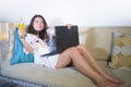 Lifestyle natural portrait of young pretty and happy Asian Korean student woman at home working or enjoying using laptop computer Royalty Free Stock Photo