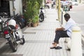 Lifestyle of older man malaysian people feeling lonely in morning time