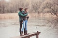 Lifestyle outdoor capture of young loving couple on the walk in early spring Royalty Free Stock Photo