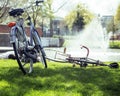 Lifestyle people concept: couple of bicycle on green grass in summer park at fountain Royalty Free Stock Photo