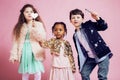 Lifestyle people concept: diverse nation children playing together, boy and girl, caucasian and african american