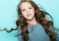 Lifestyle  and people concept: litle girl kid with long curly ha Royalty Free Stock Photo