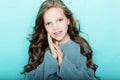 Lifestyle and people concept: litle girl kid with long curly hair, studio shoot. Royalty Free Stock Photo