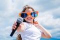Lifestyle and People Concept. make your voice louder. teen girl singing song with microphone. having a party. Happy kid Royalty Free Stock Photo