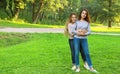 lifestyle and people concept: mature mother and adult daughter hugging in the park Royalty Free Stock Photo