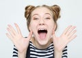 Lifestyle and people concept: Shocked scared beautiful young woman, mouth widely opened Royalty Free Stock Photo