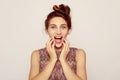 Lifestyle and people concept: Shocked scared beautiful young woman, mouth widely opened Royalty Free Stock Photo