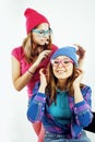 Lifestyle people concept: two pretty stylish modern hipster teen girl having fun together, happy smiling making selfie Royalty Free Stock Photo