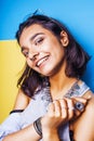 Lifestyle people concept. young pretty smiling indian girl with long nails wearing lot of jewelry rings, asian summer Royalty Free Stock Photo