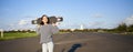 Lifestyle and people. Young asian girl posing with longboard, skating on her cruiser. Smiling woman holding skateboard Royalty Free Stock Photo