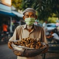 lifestyle photo malaysia street vendor sells nuts Royalty Free Stock Photo