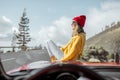 Woman tarveling by car on the mountain road Royalty Free Stock Photo