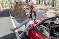 Woman tarveling by car on the mountain road Royalty Free Stock Photo