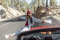 Woman tarveling by car on the mountain road Royalty Free Stock Photo