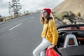 Woman tarveling by car on the mountain road Royalty Free Stock Photo