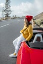 Woman tarveling by car on the mountain road Royalty Free Stock Photo