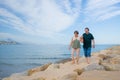 Lifestyle portrait of loving happy and sweet mature couple - senior retired husband and wife on 70s enjoying beach walk relaxed Royalty Free Stock Photo