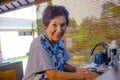 lifestyle portrait of senior happy and sweet Asian Japanese retired, woman cooking at home kitchen alone neat and tidy Royalty Free Stock Photo