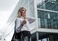 Portrait of a young confident business woman outdoors in a finance environment Royalty Free Stock Photo