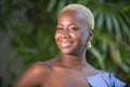 Lifestyle portrait of young attractive and joyful black african american woman smiling happy posing cheerful at home terrace with Royalty Free Stock Photo