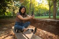 Lifestyle portrait of young happy and beautiful Asian Korean woman taking selfie picture with mobile phone relaxed and cheerful Royalty Free Stock Photo