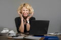 Lifestyle portrait of young stressed and messy business woman working at office laptop computer desk feeling tired and overwhelmed Royalty Free Stock Photo