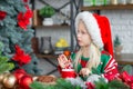 Cute little child girl eating sweet cookies and drinking hot chocolate Royalty Free Stock Photo