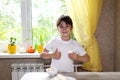 Lifestyle preschooler child girl cook food in the kitchen. development of fine motor skills in everyday life from scrap materials