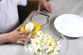 Lifestyle preschooler child girl cook food in the kitchen. development of fine motor skills in everyday life from scrap materials