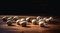 Lifestyle product shot of black and white spotted quail eggs in the light on a wooden table. Play light and shadow
