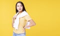 Lifestyle relax in winter season concept. Positive Asian woman wear casual clothing with white sweater around her shoulder while Royalty Free Stock Photo