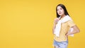 Lifestyle relax in winter season concept. Positive Asian woman wear casual clothing with white sweater around her shoulder while Royalty Free Stock Photo