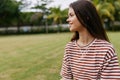 blogger woman nature grass tree lifestyle park happy phone smiling cellphone palm Royalty Free Stock Photo