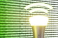 Lifi symbol with bulb in front of screen