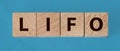 LIFO Last in, first out word on wooden cubes. Accounting, Business Concept Royalty Free Stock Photo