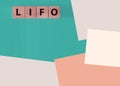 LIFO Last in, first out word on wooden cubes. Accounting, Business Concept Royalty Free Stock Photo