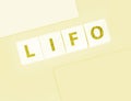 LIFO Last in, first out word on wooden cubes. Accounting, Business Concept Royalty Free Stock Photo