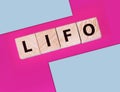 LIFO Last in, first out word on wooden cubes. Accounting, Business Concept Royalty Free Stock Photo