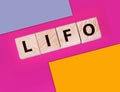 LIFO Last in, first out word on wooden cubes. Accounting, Business Concept Royalty Free Stock Photo