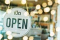 Lift lockdown. Open sign board with Thai language hanging on glass door in cafe coffee shop, quarantine, cafe restaurant Royalty Free Stock Photo