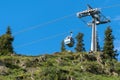Lift in the mountains under blue sky. Royalty Free Stock Photo