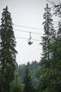 lift in the mountains. ski lift at the ski resort, designed to climb to the top of the mountain skiers and snowboarders Royalty Free Stock Photo