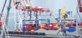 Lifting cargo cranes, ships and grain dryer in Sea Port Royalty Free Stock Photo