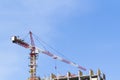 Lifting crane. Construction of high structures. Rise to height. Royalty Free Stock Photo