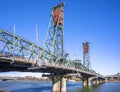 Lifting Hawthorne Bridge with two towers across the Willamette River in the center of Portland Oregon Royalty Free Stock Photo
