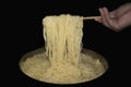 lifting noodles with chopstick Royalty Free Stock Photo